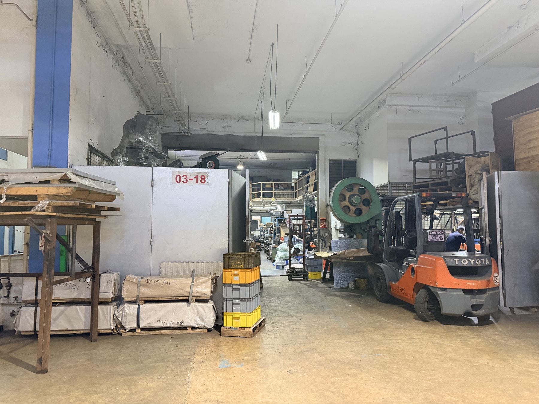 Unit interior with forklift and ongoing operations, 10 Admiralty Street